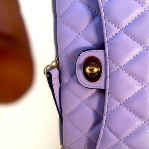 A cute, light, purple clutch